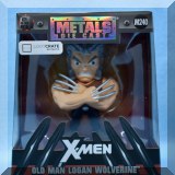 C23. Die cast Wolverine figurine. 
